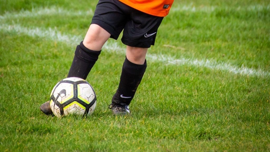 dribbling a football