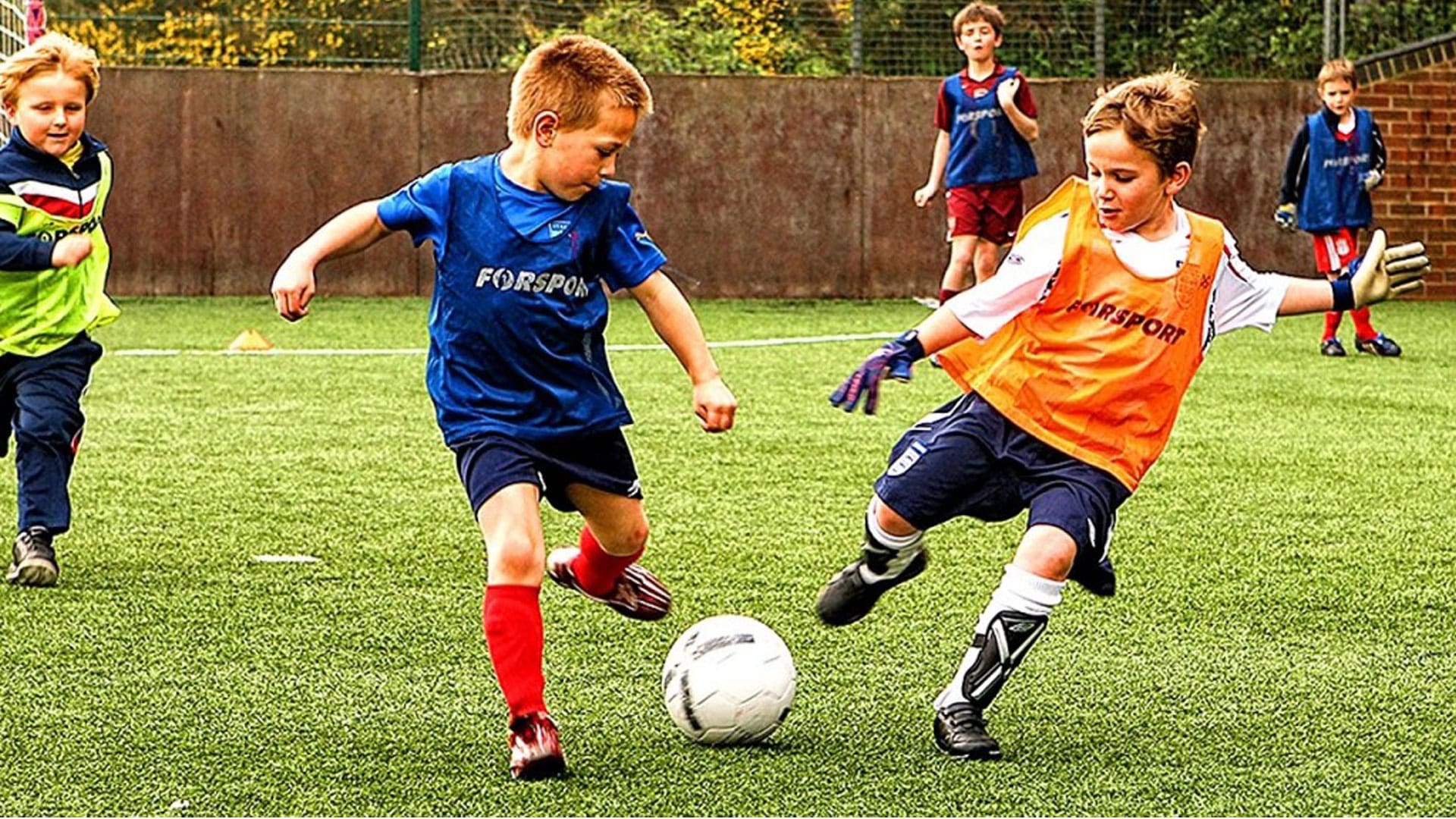 kids playing football